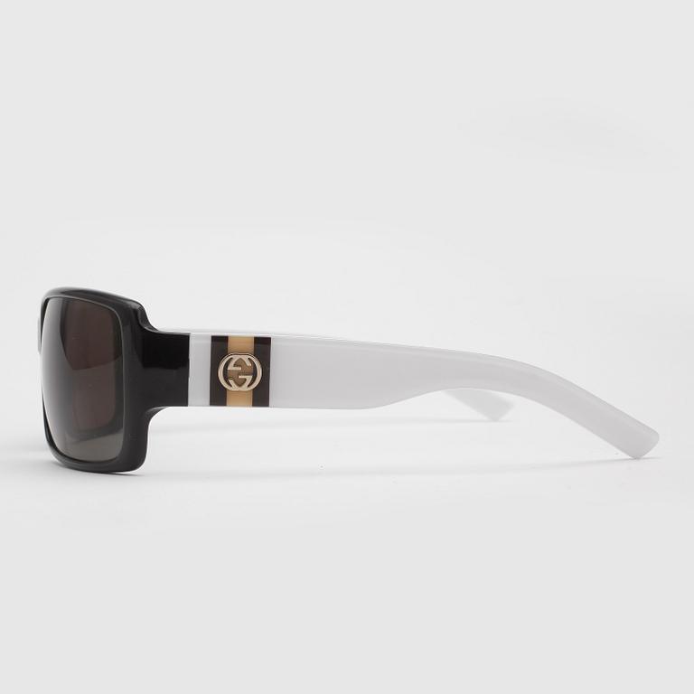 SOLGLASÖGON, Gucci.
