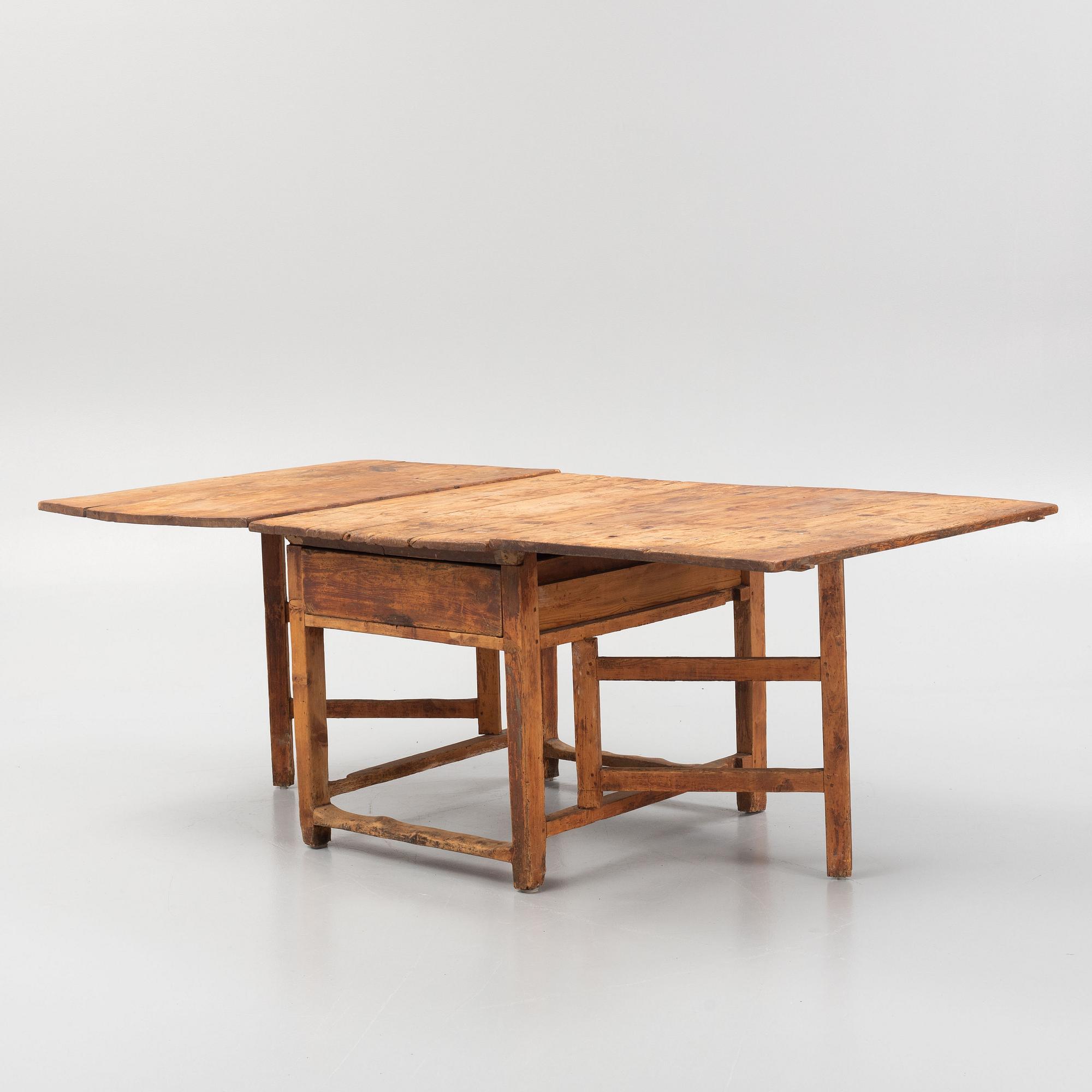 A 19th century gate-legged table.