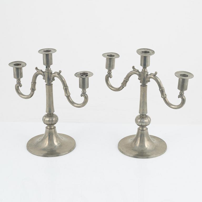 Edvin Ollers, a pair of pewter candelabra, Stockholm, 1922.