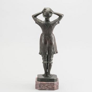 HUGO HECK, a signed and dated bronze sculpture.