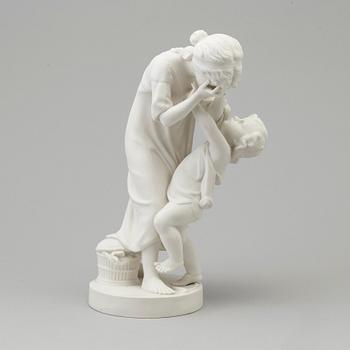 A biscuit figure of a woman and a boy, Gustafsberg, early 20th Century.