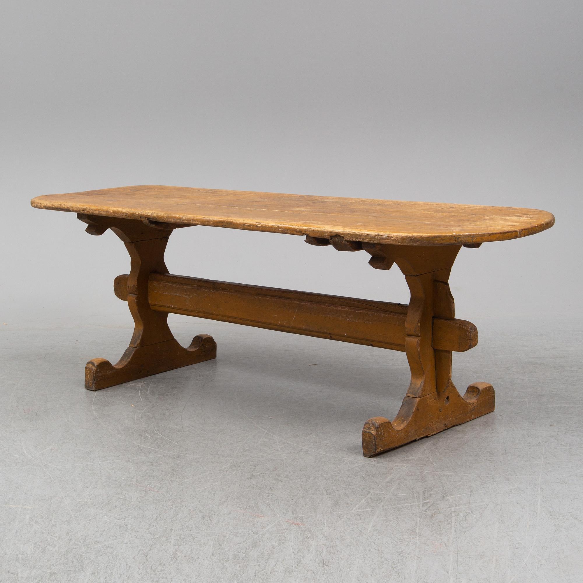 A painted pine table, 19th Century.