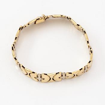 A 14K white and yellow gold bracelet.