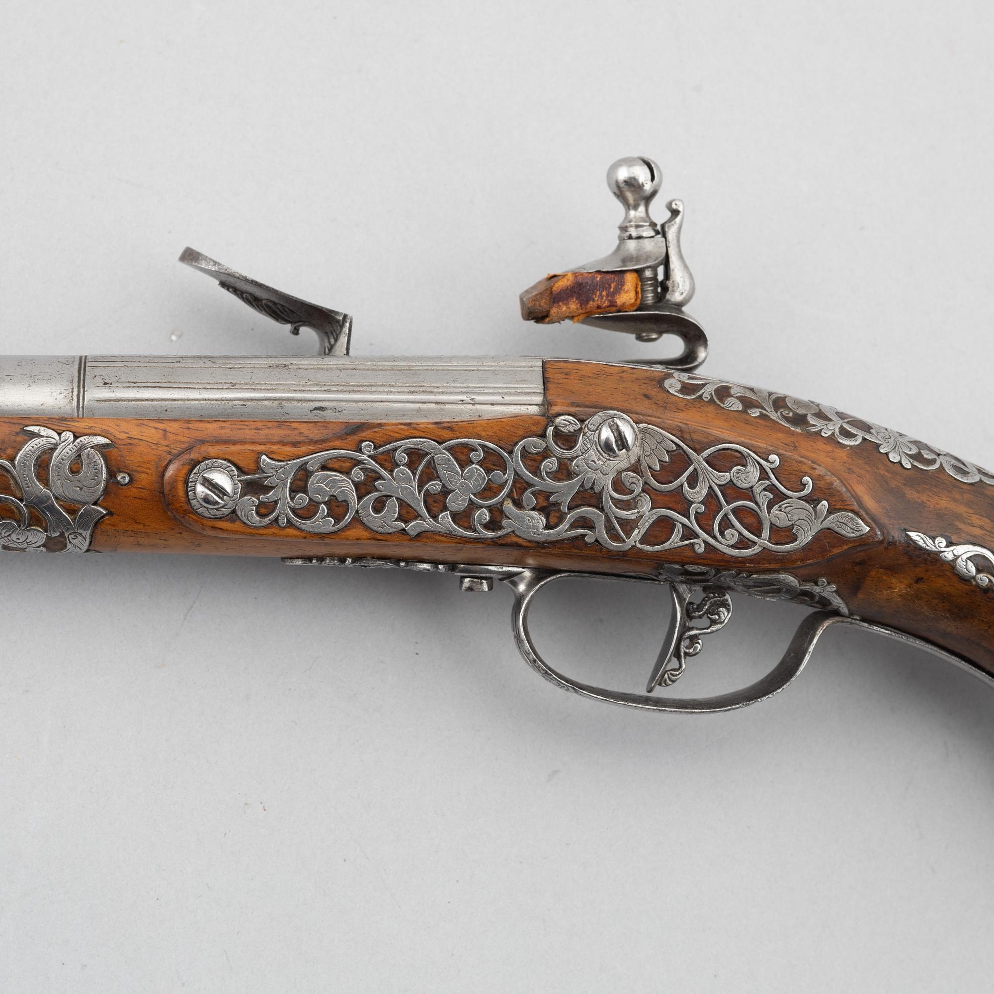 Flintlock pistol, signed Ivan Garatto. Brescia 17th century.
