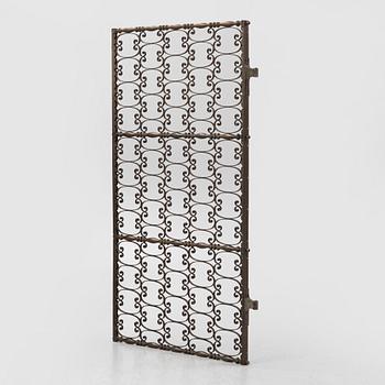 A brass gate, 20th century.