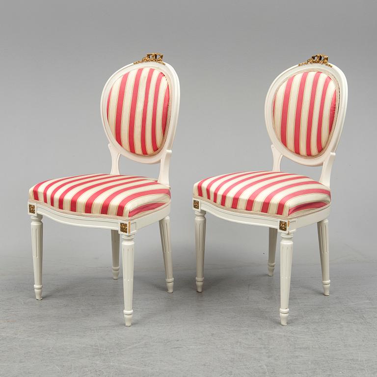 A set of 12 Swedish chairs, gustavian style, for NK (Nordiska Kompaniet), mid 20th century.