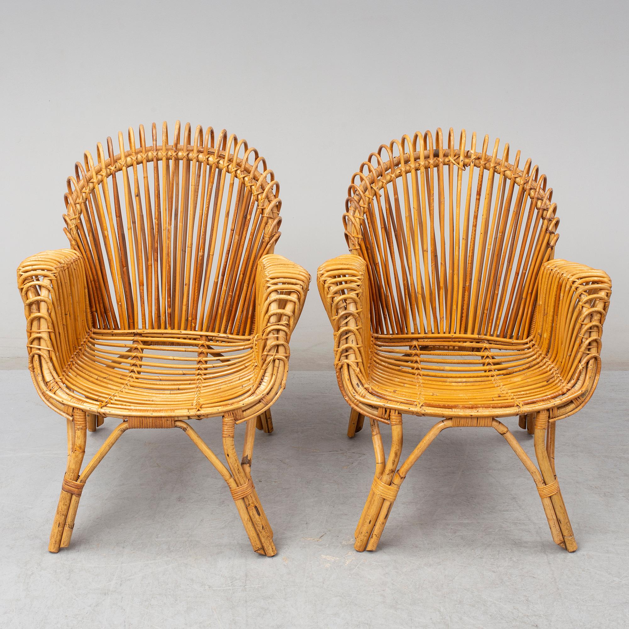 A pair of rattan armchairs, Emilio Paoli, via Vigna Nuova, 8, Firenze, Italy, second half of the 20th century. Signed.