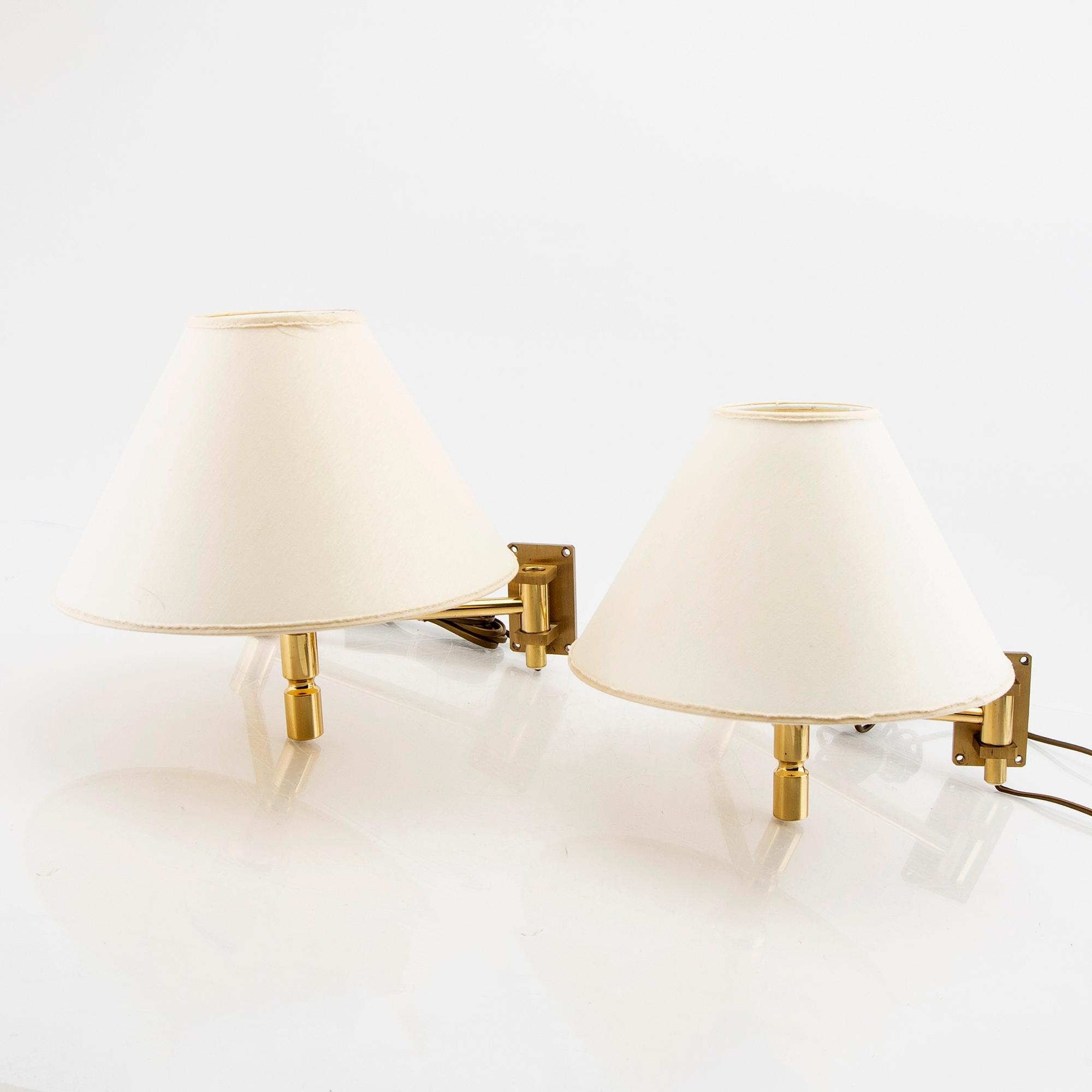 A pair of Evå wall lamps late 20th century.