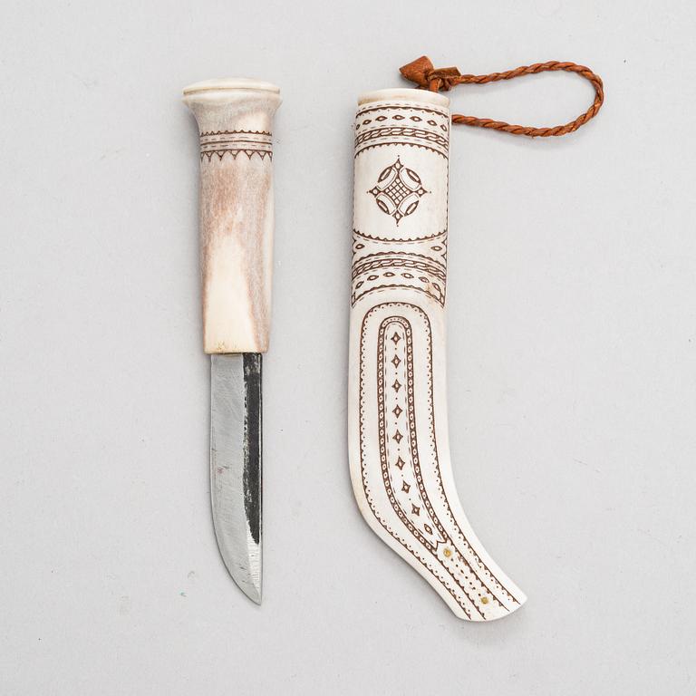 A horn knife / decoration knife signed Thore Sunna sami handicraft / duodji  from second half of the 20th century.