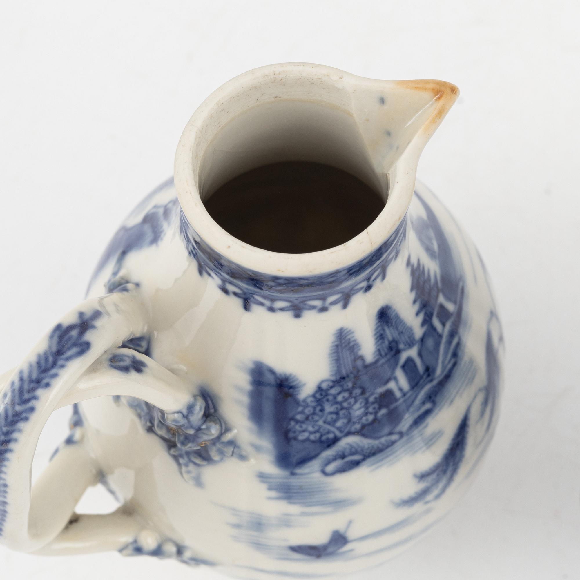 A blue and white moon flask and two creamers, porcelain, China, 18th-19th century.