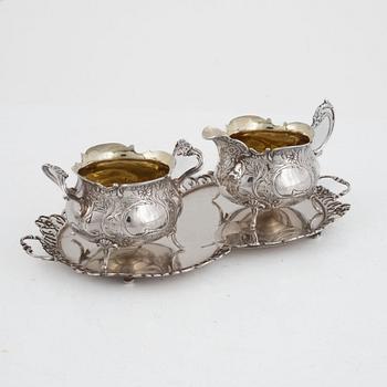 A Swedish silver coffee pot, creamer, tray and  sugar bowl, mark of GEWE, Malmö 1971-74.