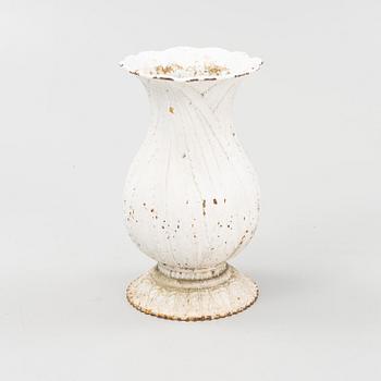 A 20th Century cast iron garden urn.