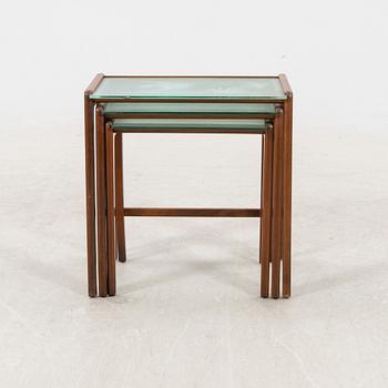 A 1950s mahogany nesting table.