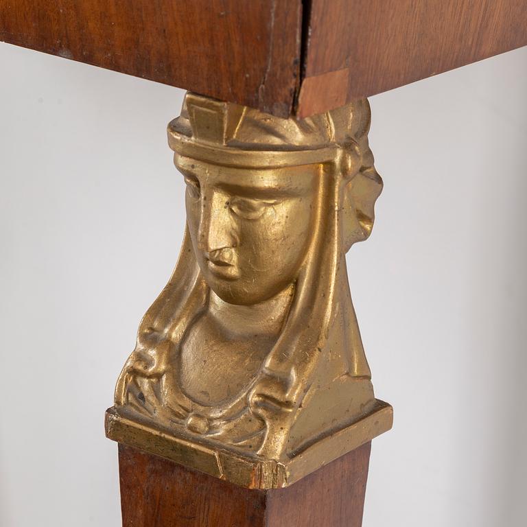 A Swedish Empire mirror and console table, first half of the 19th century.