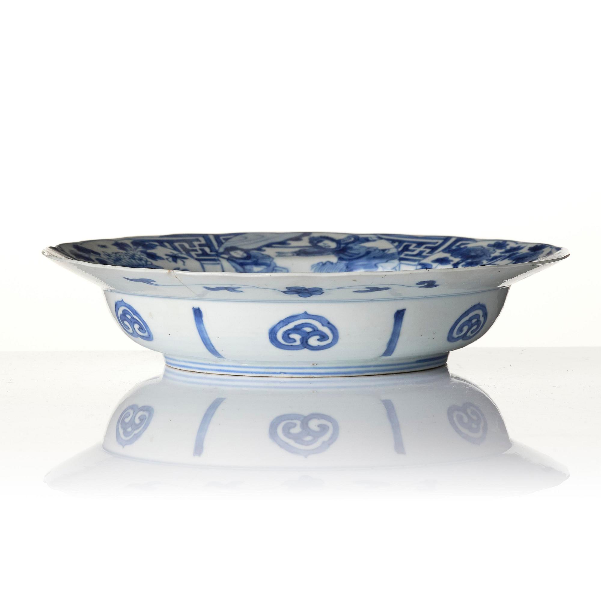 A blue and white dish, Qing dynasty, Kangxi mark and of the period (1662-1722).