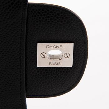 CHANEL Jumbo Caviar Double Flap Bag, 2018.