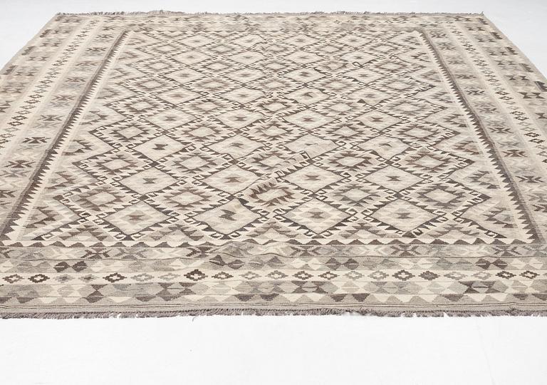 A Kilim carpet, circa 400 x 306 cm.