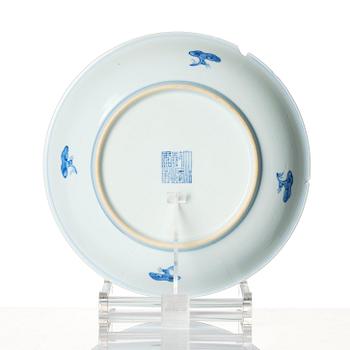 A blue and white deep dish, Qing dynasty with a Qianlong seal mark.