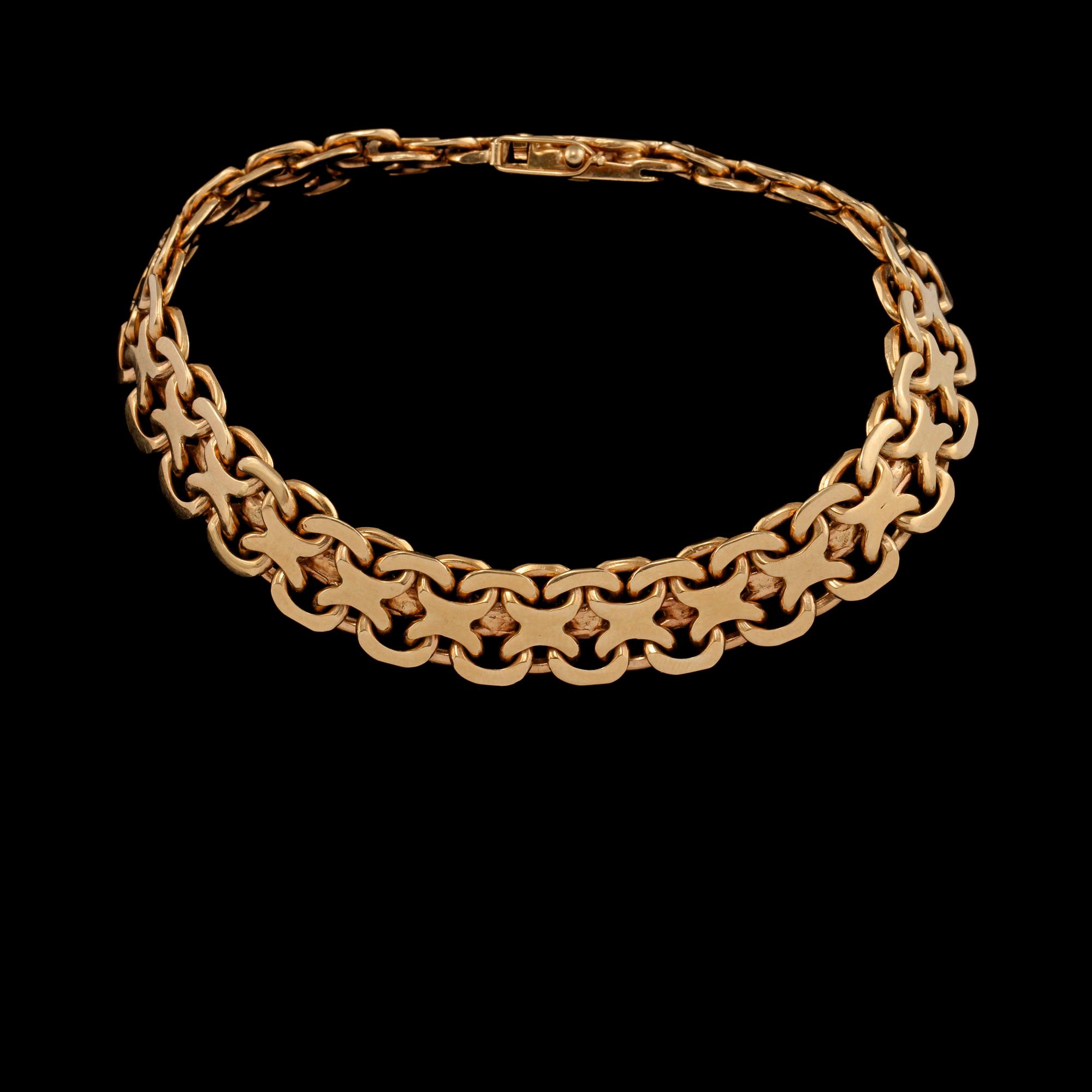 ARMLÄNK, 18k guld, Erik Wahlbeck, Stockholm, 1947. Vikt 38 g.