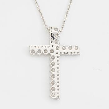 Brilliant cut diamond cross necklace.