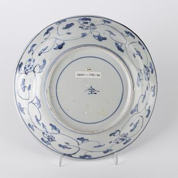 A Japanese blue and white dish, 18th Century.