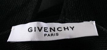 A black tight strech dress by Givenchy.