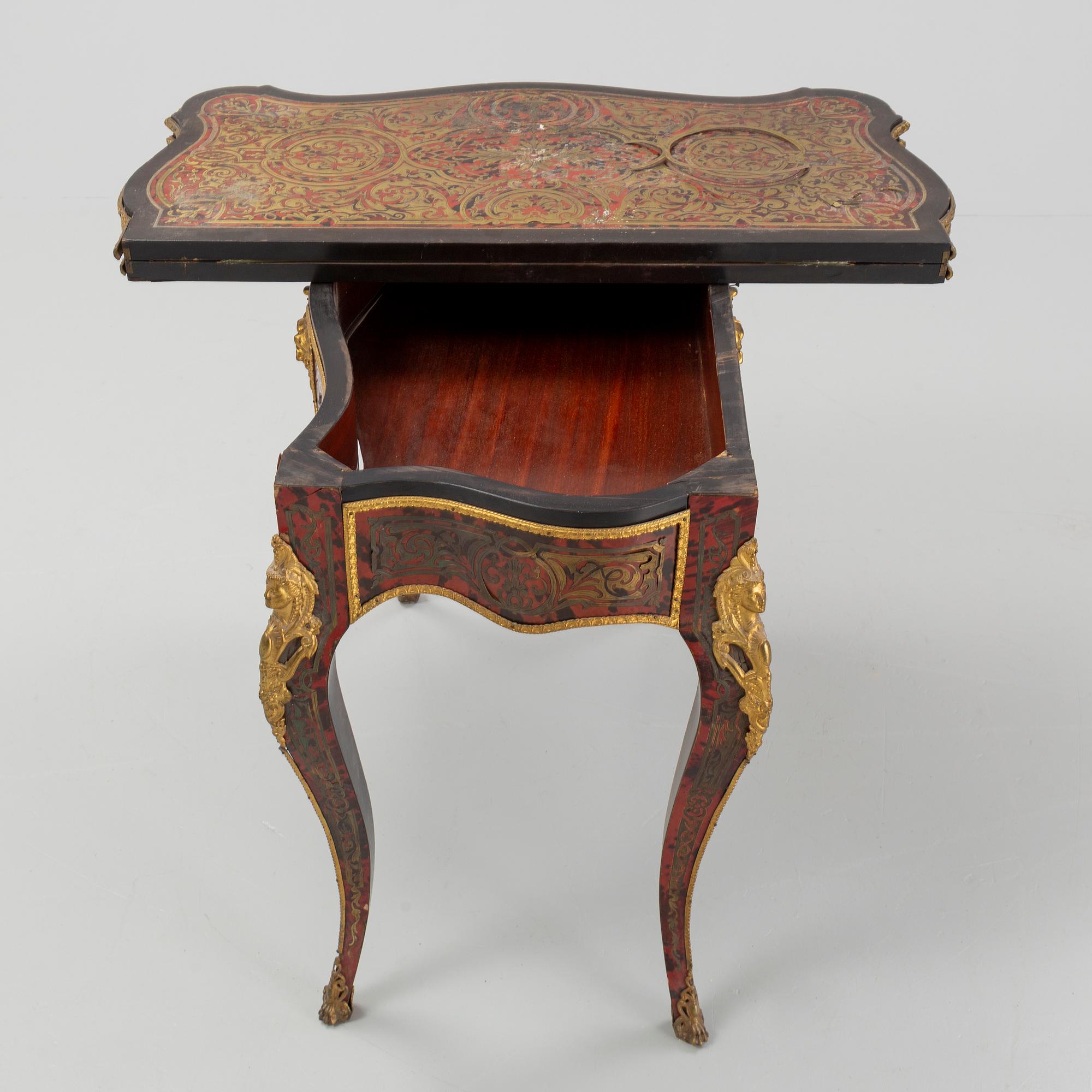 A Boulle style card table, end of the 19th Century.