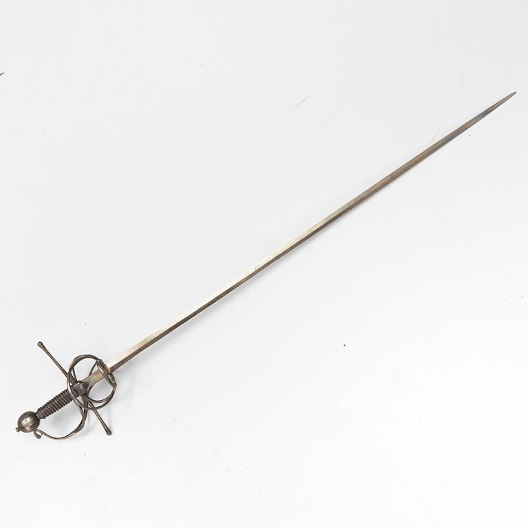 A 17th Century swept hilt rapier.