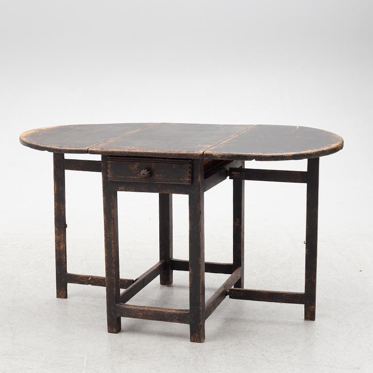 A Swedish wooden table, 19th century.