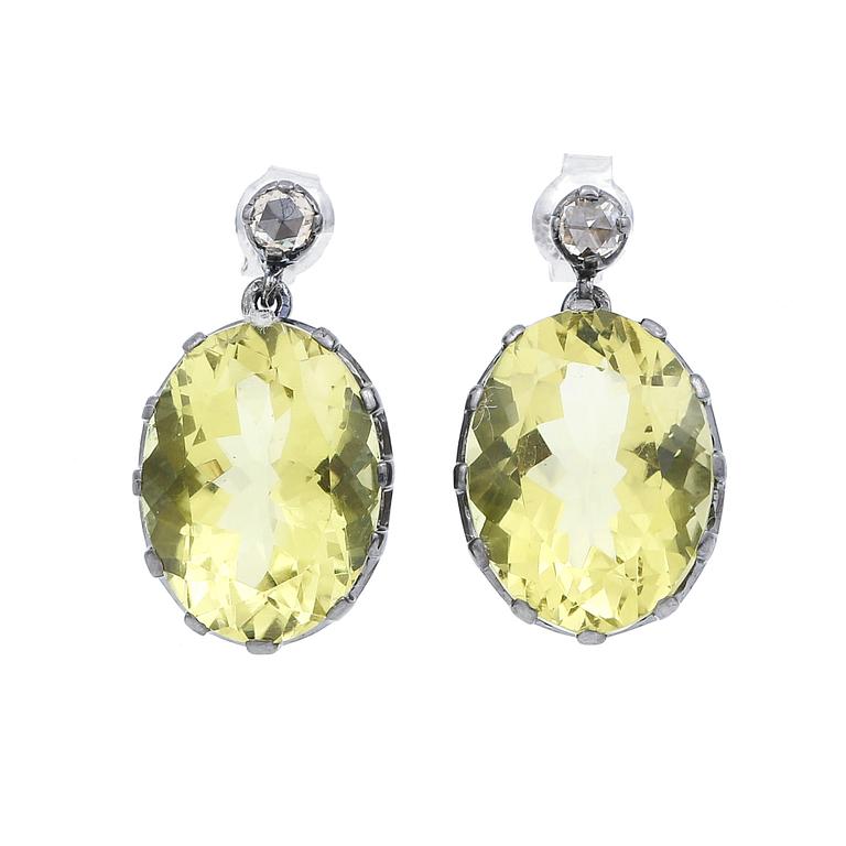 ÖRHÄNGEN, silver med ovalslipade gula topas tot ca 21,94 ct och rosenslipade diamanter. Vikt ca 8,32 g.