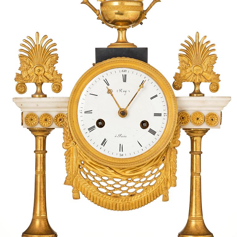 A late Louis XVI ormolu and marble portico clock, Paris, latge 18th century.