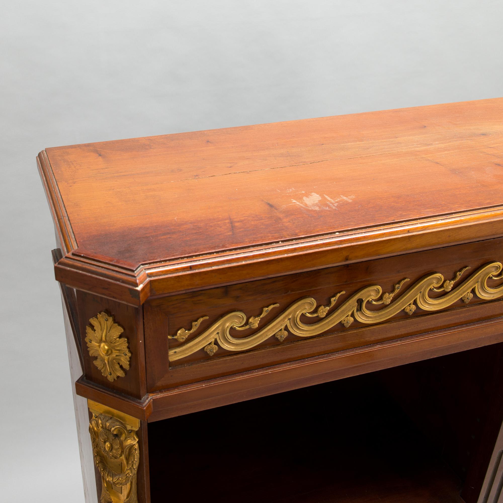 A 20th-century Louis XVI style bookcase.