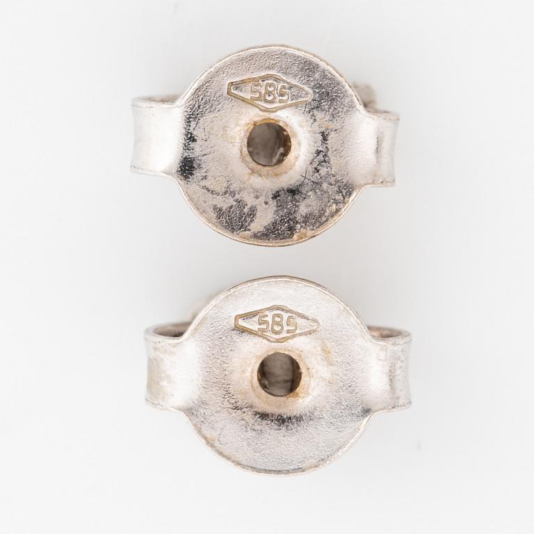 Colour treated brilliant cut diamond earrings.