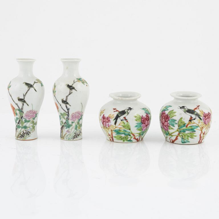 A set of eight Chinese vases, late Qing dynasty/20th Century.