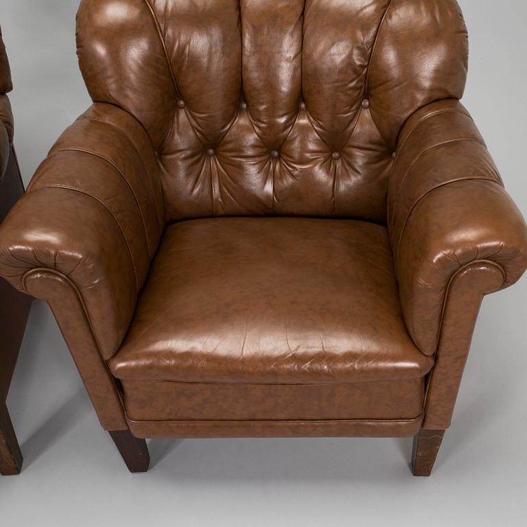 A pair of 1920s armchair.