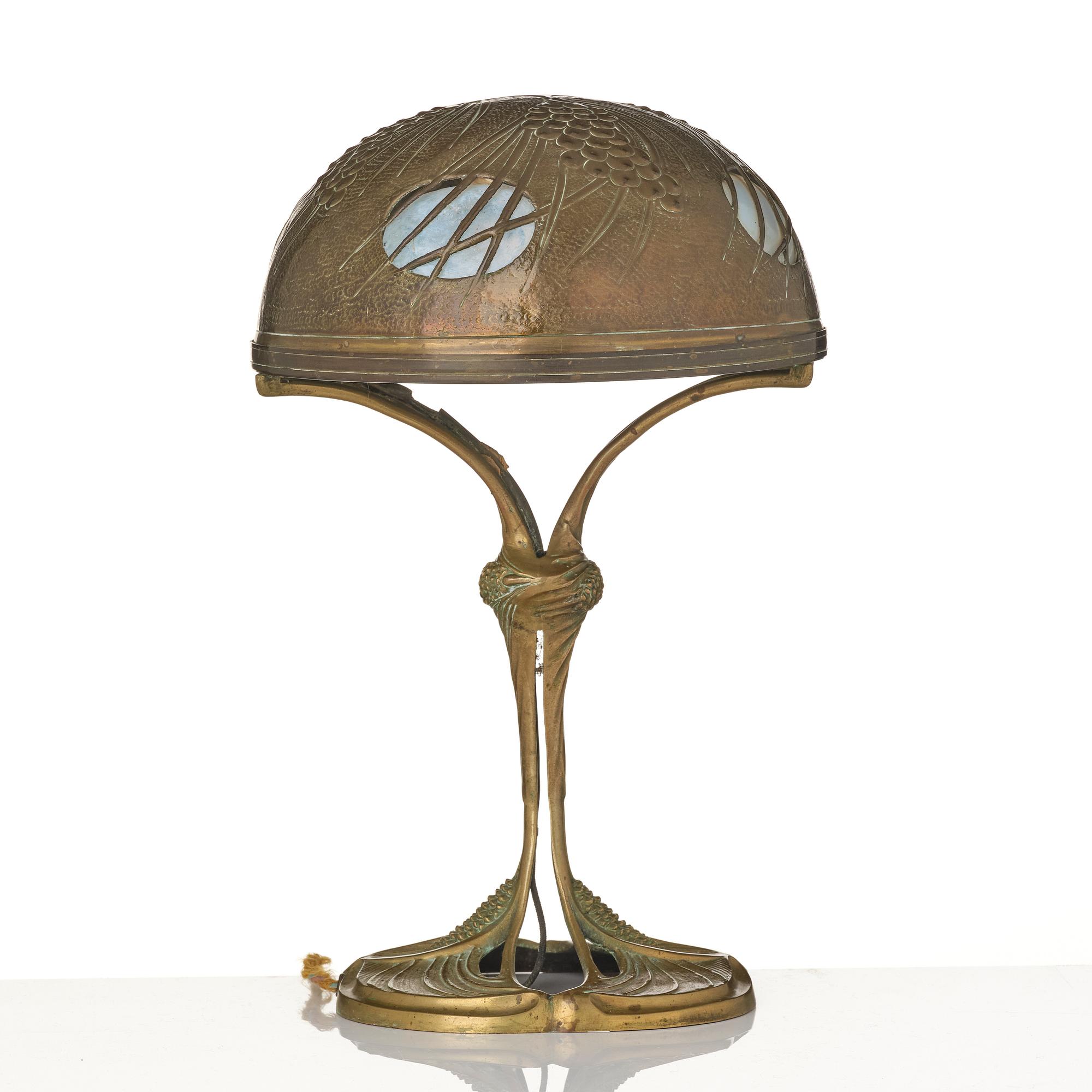 A bronze and brass table lamp, with signature Georges Leleu.