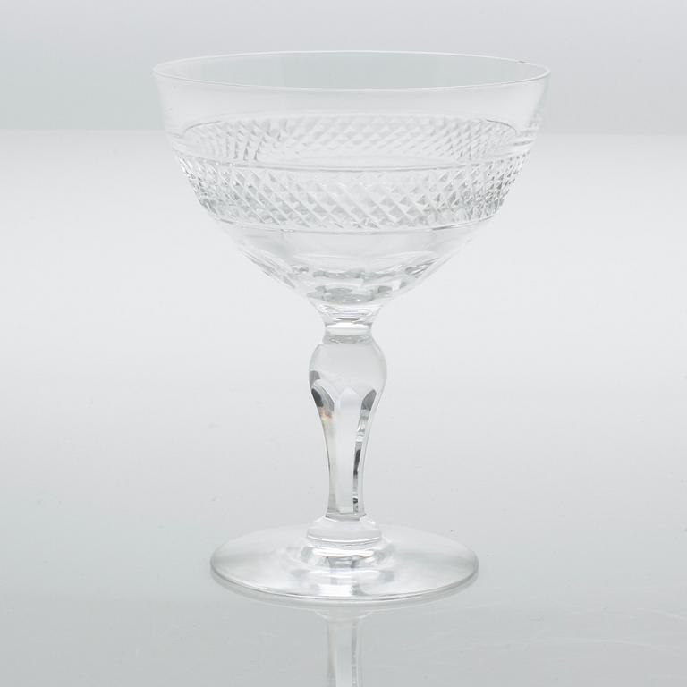 Eleven glass champagne cups, around mid 20th century.