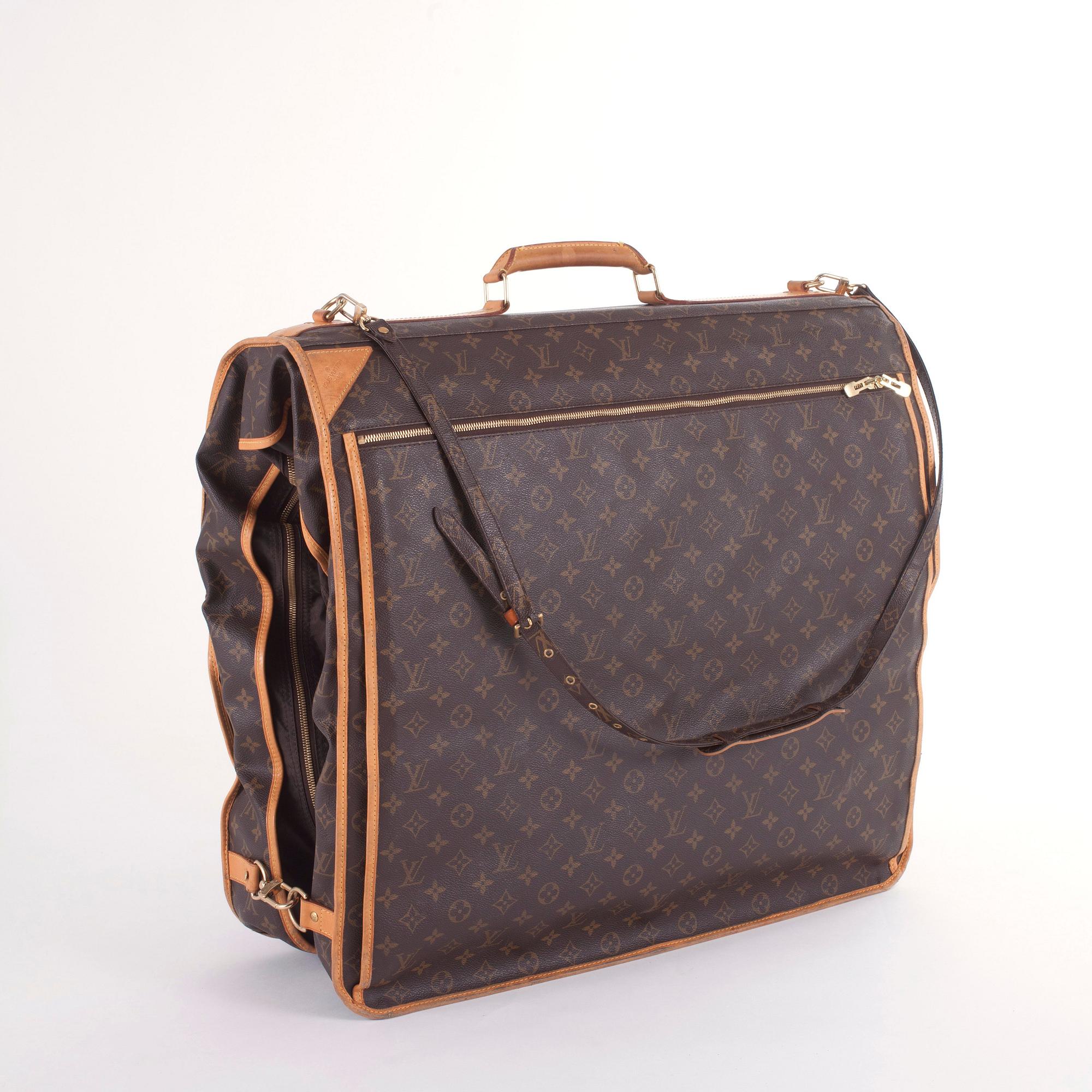 LOUIS VUITTON, a monogram canvas garment cover.