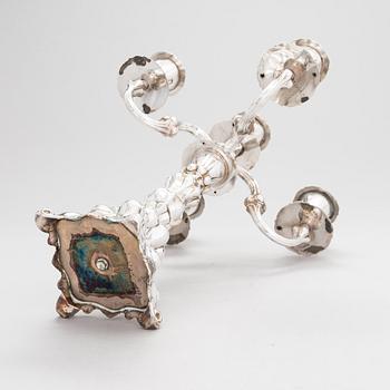 Kynttelikkö, hopeaa, Kultakeskus, Hämeenlinna 1987-88.