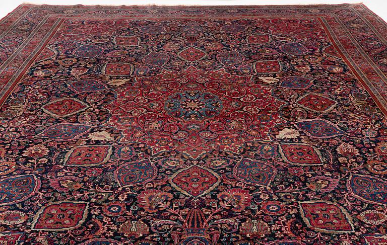 An antique Moud carpet of 'Ardabil' design, approximately 445.5 x 332 cm.