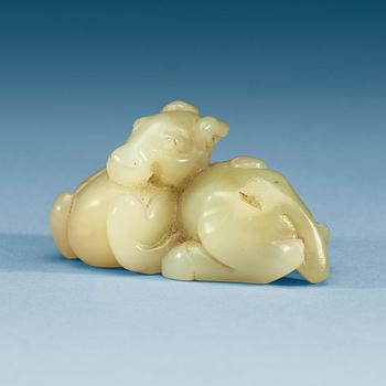 A Chinese nephrite figure of a reclining horse.