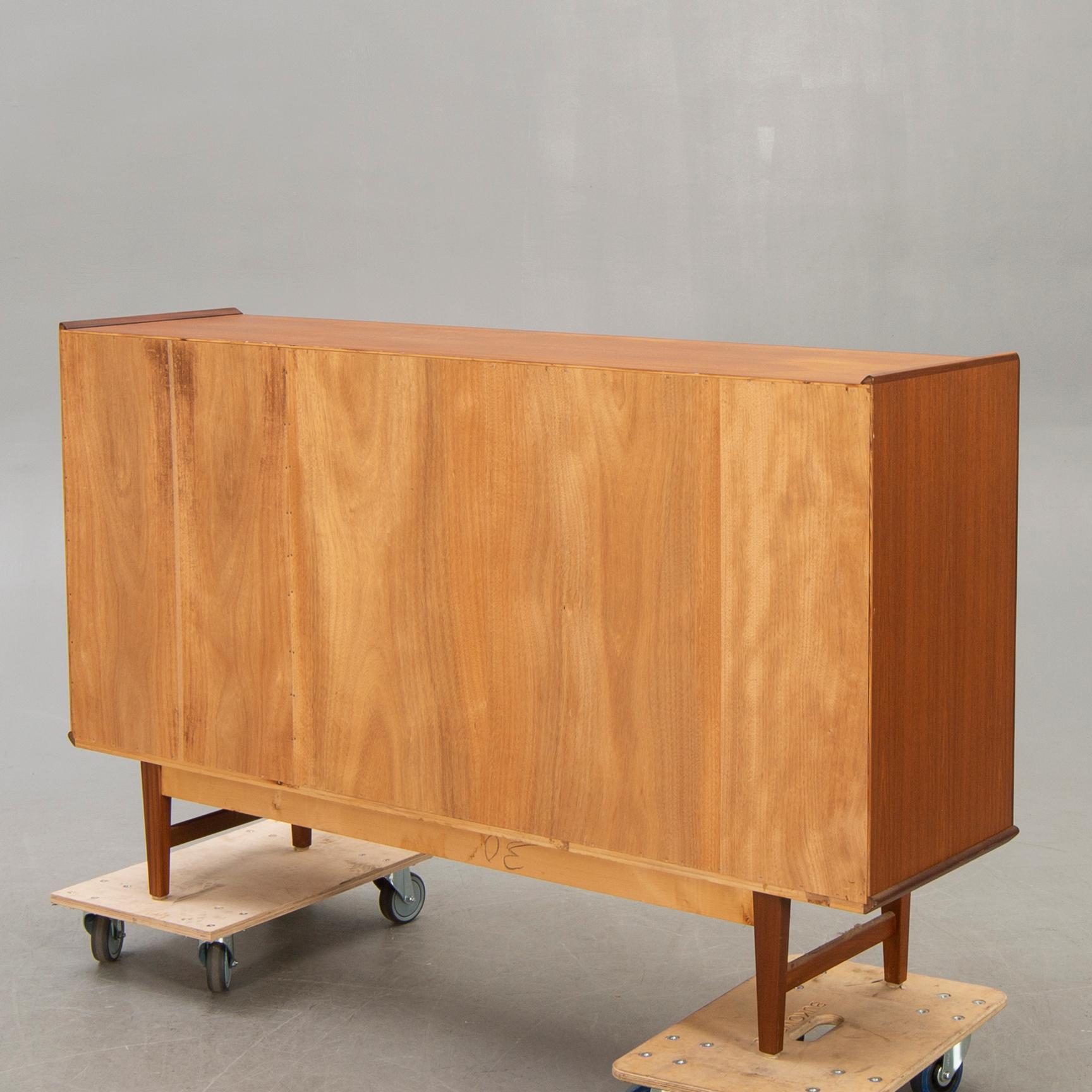 A 1960s teak sideboard.