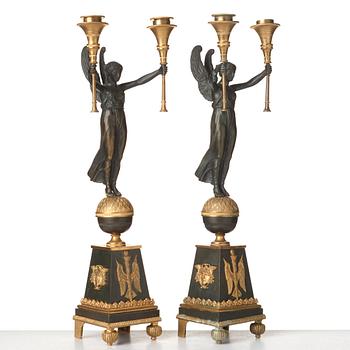 A pair of Empire-style 20th century candelabra.