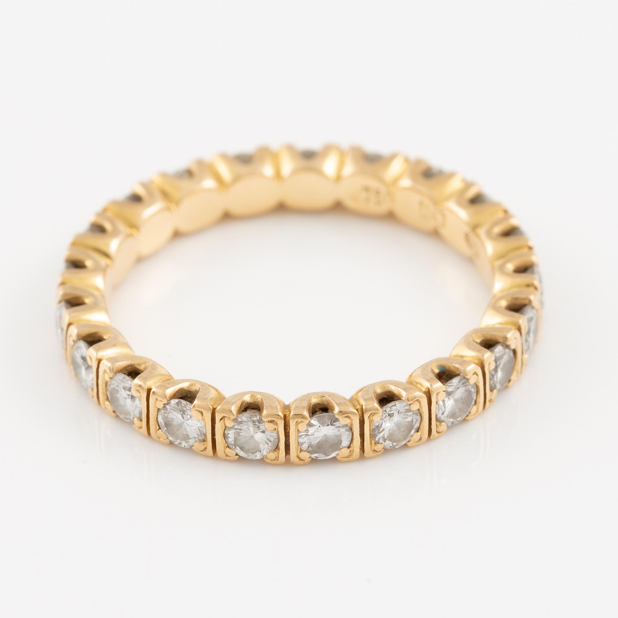 Ring in 18K gold set with round brilliant-cut diamonds, eternity band.