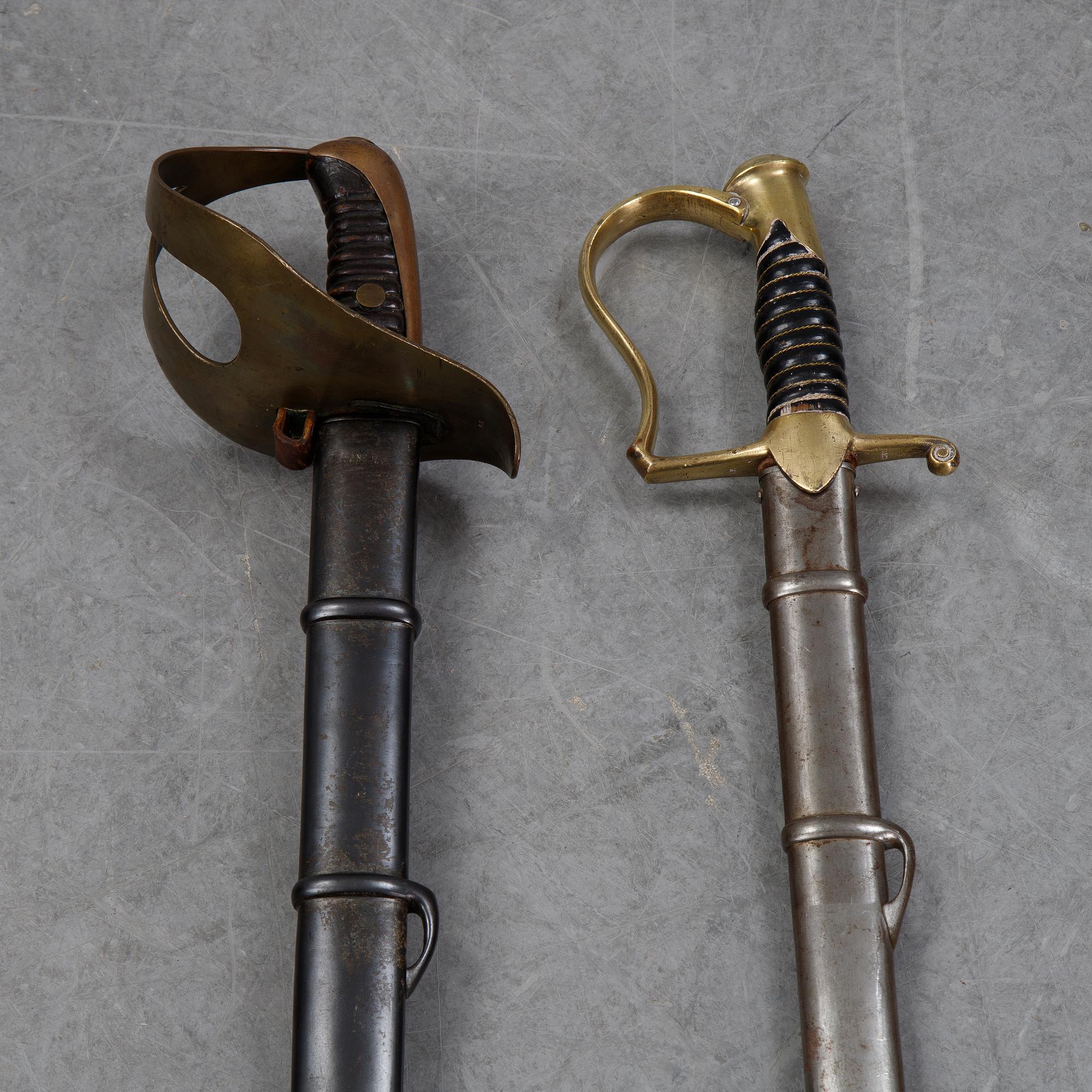 Two Swedish 19th Cenury military swords with scabbards.