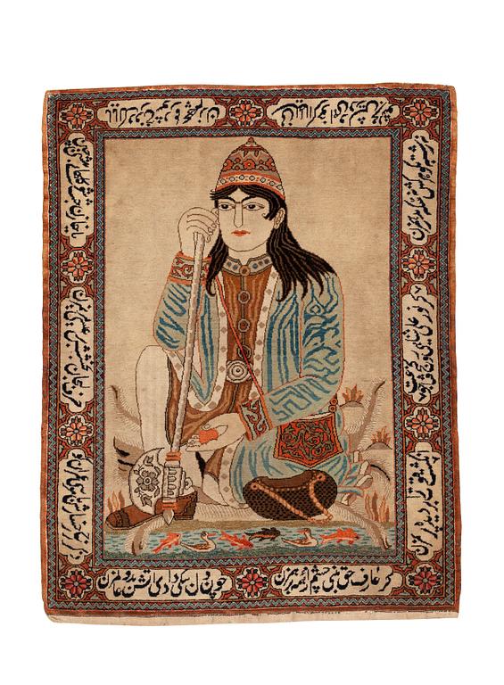 A rug, semi-antique Kashan figural, ca 105 x 79,5 cm.