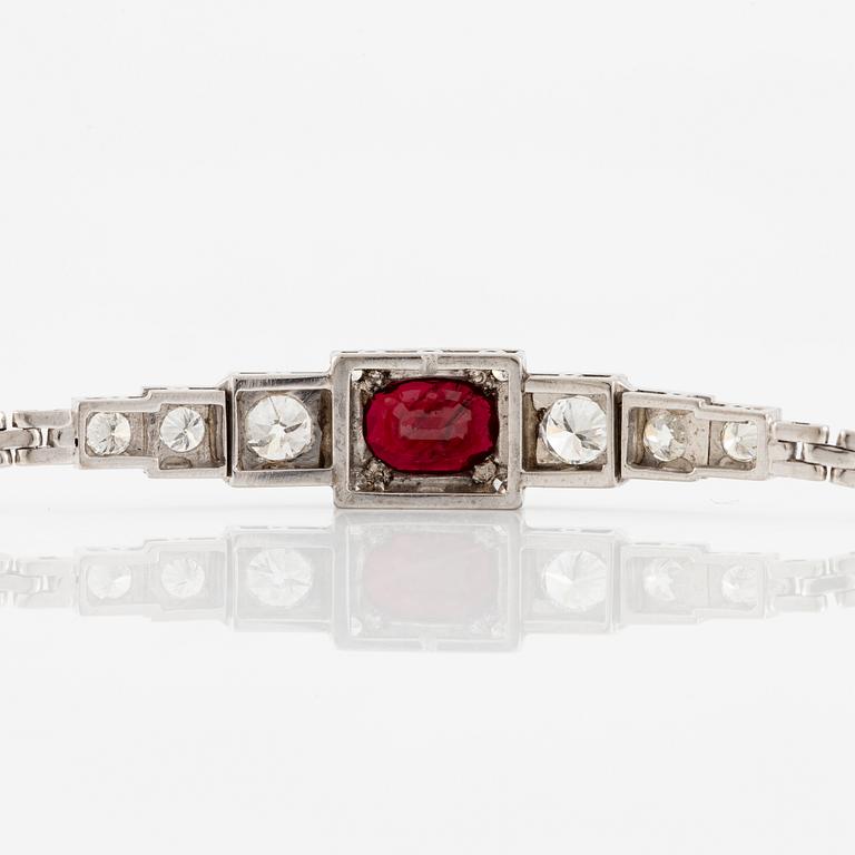 A bracelet 18K white gold with ruby and brilliant-cut diamonds. Malmö 1948.