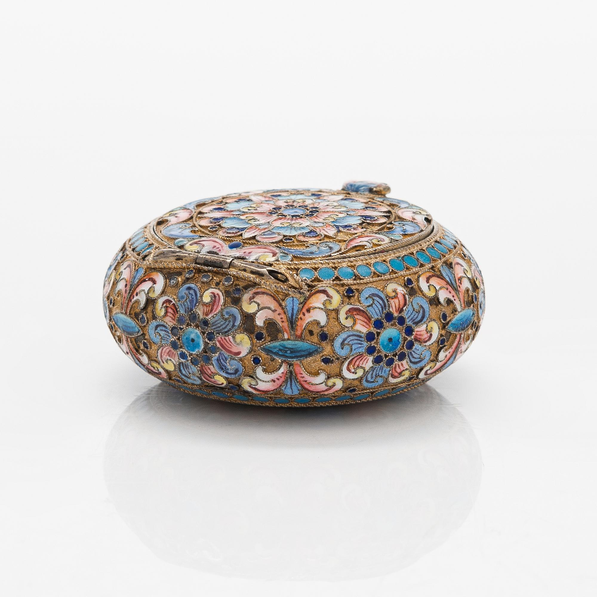 A gilt silver cloisonné enamel pill box, maker's mark of D. Nikitin, Moscow 1908-17.
