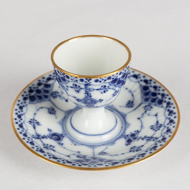 A 'Blue Fluted' porcelain egg stand and a pair of small dishes, Royal Copenhagen, model 543 and 1004, 20th century.