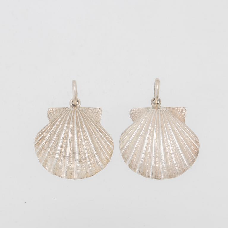 A pair of silver Pilgrim Shell pendants by Berit Johansson, W&A Sävsjö Goldsmith.